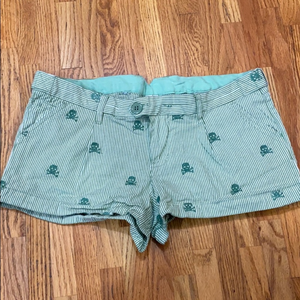 Green YNQ Shorts with Embroidered Skulls